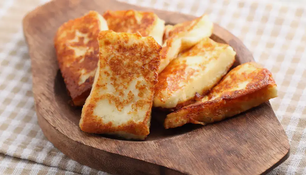 A plate of grilled halloumi cheese