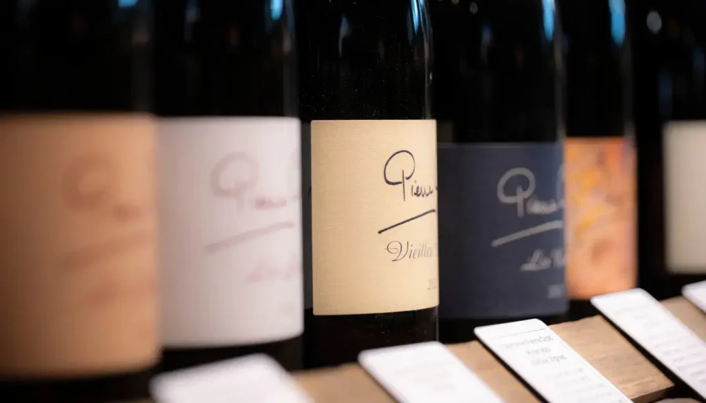 Close-up of labels on bottles of wine
